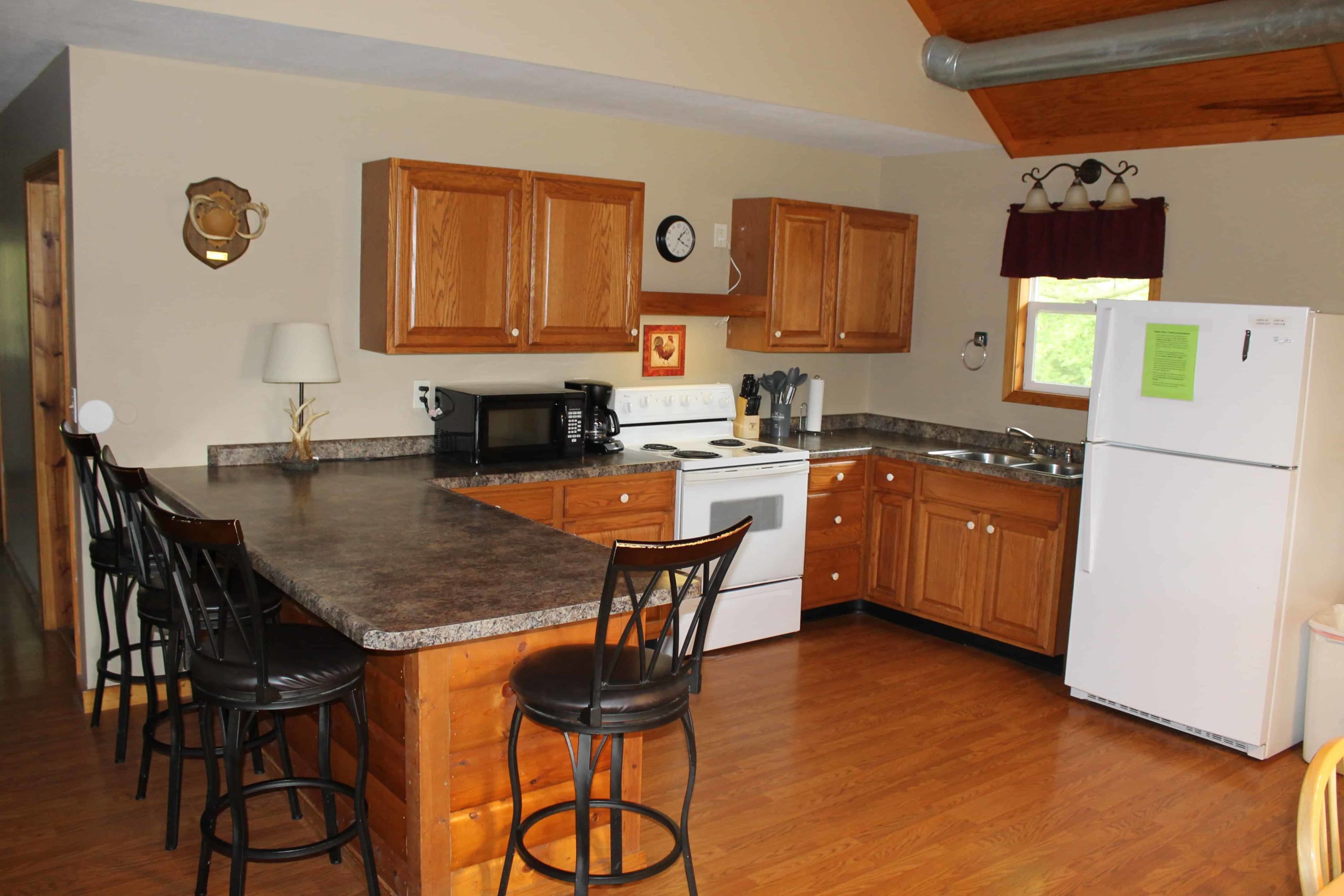 kitchen inside one of the vacation cabin rentals in shelbyville illinois